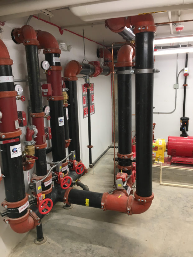 Fire Protection Systems Room Black Pipes Red Valves